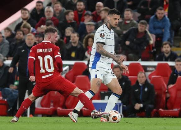 . - Liverpool v Atalanta, UEFA Europa League, Quarter-Final first leg, Anfield Stadium, Liverpool, UK. - 11th April 2024. Gianluca Scamacca of Atalanta battles Alexis Mac Allister of Liverpool. - Liverpool v Atalanta, UEFA Europa League, Quarter-Final first leg, Anfield Stadium, Liverpool, UK. - 11th April 2024. Liverpool Anfield Stadium UK Copyright: xDanxWeirx CP_Liverpool_Atalanta_01
