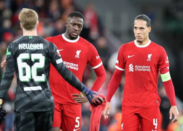 11th April 2024; Anfield, Liverpool, Merseyside, England; Europa League, Quarter Final;, First Leg Football, Liverpool versus Atalanta; Ibrahima Konate and Virgil van Dijk of Liverpool look dejected at full time  ActionPlus12628591 DavidxBlunsden