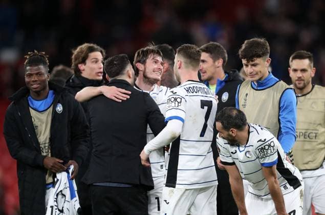 11th April 2024; Anfield, Liverpool, Merseyside, England; Europa League, Quarter Final;, First Leg Football, Liverpool versus Atalanta; Atalanta players celebrate at full time in front of the visiting fans  ActionPlus12628592 DavidxBlunsden