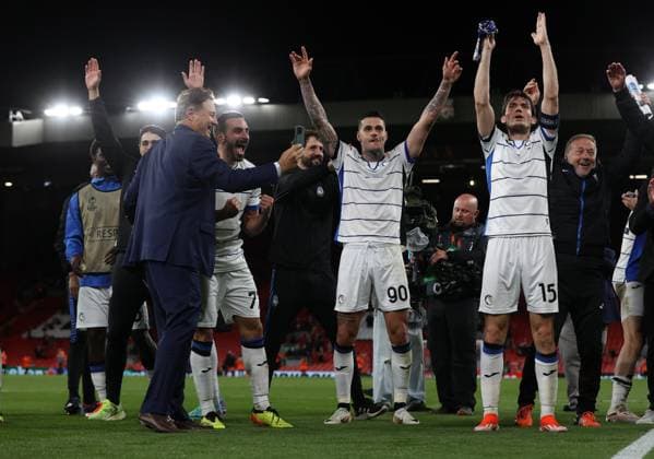 11th April 2024; Anfield, Liverpool, Merseyside, England; Europa League, Quarter Final;, First Leg Football, Liverpool versus Atalanta; Atalanta players celebrate at full time in front of the visiting fans  ActionPlus12628570 DavidxBlunsden