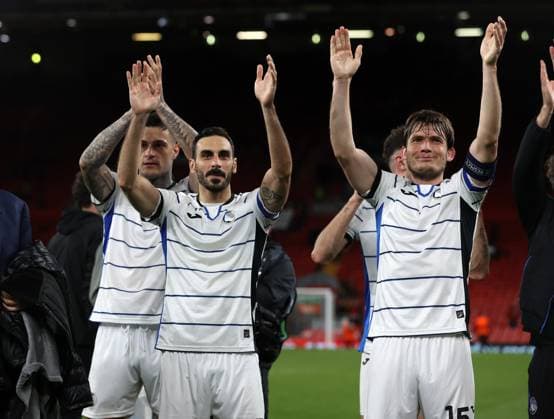 11th April 2024; Anfield, Liverpool, Merseyside, England; Europa League, Quarter Final;, First Leg Football, Liverpool versus Atalanta; Atalanta players celebrate at full time in front of the visiting fans  ActionPlus12628573 DavidxBlunsden