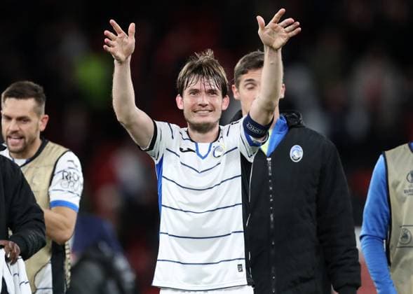 11th April 2024; Anfield, Liverpool, Merseyside, England; Europa League, Quarter Final;, First Leg Football, Liverpool versus Atalanta; Marten de Roon of Atalanta celebrates at full time in front of the visiting fans  ActionPlus12628594 DavidxBlunsden
