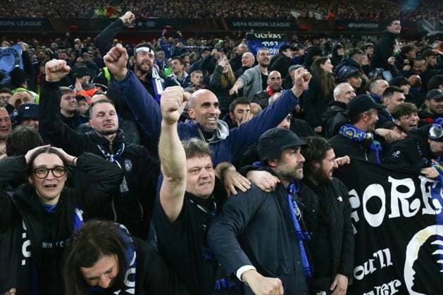 11th April 2024; Anfield, Liverpool, Merseyside, England; Europa League, Quarter Final;, First Leg Football, Liverpool versus Atalanta; Atalanta fans celebrate their third goal after 80 minutes  ActionPlus12628597 DavidxBlunsden