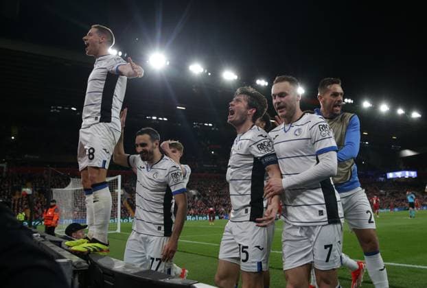 11th April 2024; Anfield, Liverpool, Merseyside, England; Europa League, Quarter Final;, First Leg Football, Liverpool versus Atalanta; Atalanta players celebrate their third goal after 80 minutes  ActionPlus12628603 DavidxBlunsden