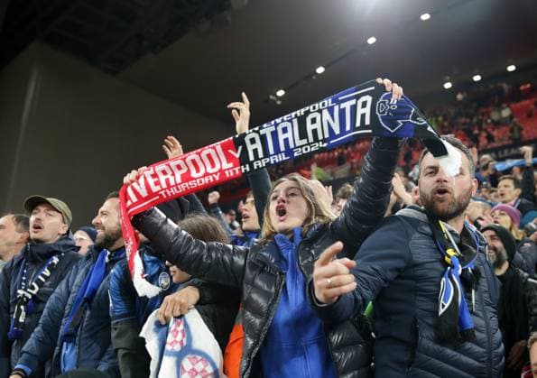 11th April 2024; Anfield, Liverpool, Merseyside, England; Europa League, Quarter Final;, First Leg Football, Liverpool versus Atalanta; Atalanta fans celebrate at full time  ActionPlus12628609 DavidxBlunsden