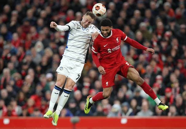 . - Liverpool v Atalanta, UEFA Europa League, Quarter-Final first leg, Anfield Stadium, Liverpool, UK. - 11th April 2024. Teun Koopmeiners of Atalanta battles Joe Gomez of Liverpool. - Liverpool v Atalanta, UEFA Europa League, Quarter-Final first leg, Anfield Stadium, Liverpool, UK. - 11th April 2024. Liverpool Anfield Stadium UK Copyright: xDanxWeirx CP_Liverpool_Atalanta_57