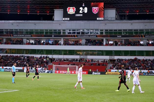 BayArena scoreboard final result 2 0 with his team before the match UEFA Europa League season 2023 2024 quarter-final match Bayer 04 Leverkusen West Ham United FC 2 0 on 11 04 2024 in Leverkusen DFL REGULATIONS PROHIBIT ANY USE OF PHOTOGRAPHS as IMAGE SEQUENCES and or QUASI VIDEO Copyright: xLacixPerenyix