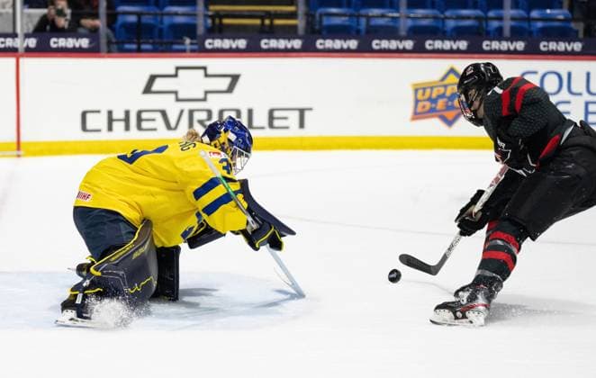 April 11, 2024, Utica, Ny, UNITED STATES: Sweden goaltender Emma Soderberg (30) stops a break away shot by Canada s Laura Stacey (7) during second period quarter final hockey action at the IIHF Women s World Hockey Championship in Utica, N.Y., Thursday, April 11, 2024. Canada News - April 11, 2024  - ZUMAc35_ 20240411_zaf_c35_115 Copyright: xChristinnexMuschix