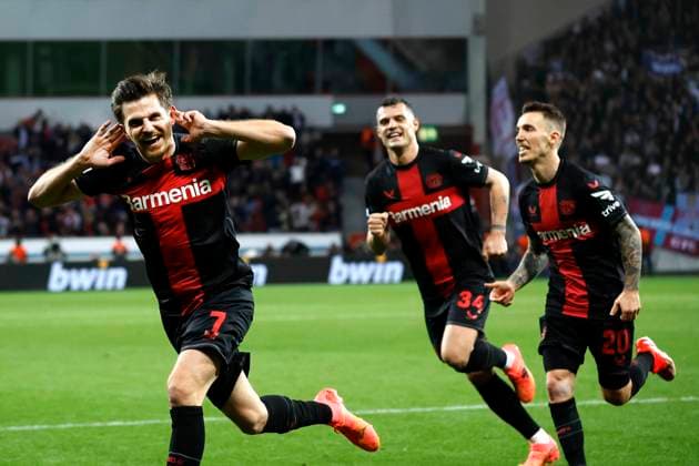 Leverkusen, Germany, UEFA Europa League, Bayer 04 Leverkusen West Ham United FC 2 0 Quarter Final,Quarter Finals 11 04 2024 at the Bay Arena in Leverkusen Jonas HOFMANN LEV left has scored the goal for 1 0 and is happy with Granit XHAKA LEV 2 v right and Alejandro GRIMALDO LEV right