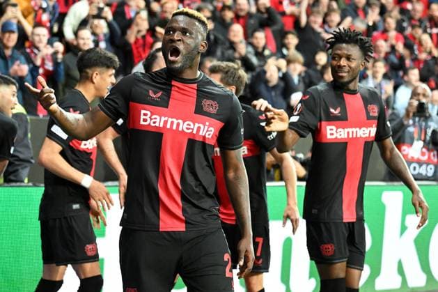 (240412) -- LEVERKUSEN, April 12, 2024 -- Victor Boniface (front) of Bayer 04 Leverkusen celebrates scoring during the UEFA Europa League quarterfinals first leg match between Bayer 04 Leverkusen and West Ham United FC in Leverkusen, Germany, April 11, 2024. (Photo by Ulrich Hufnagel Xinhua) (SP)GERMANY-LEVERKUSEN-FOOTBALL-UEFA EUROPA LEAGUE-LEVERKUSEN VS WEST HAM WuxErlixi¡¤hufunageer 