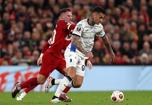 11th April 2024; Anfield, Liverpool, Merseyside, England; Europa League, Quarter Final;, First Leg Football, Liverpool versus Atalanta; Gianluca Scamacca of Atalanta takes on Alexis MacAllister of Liverpool  ActionPlus12628912 DavidxBlunsden