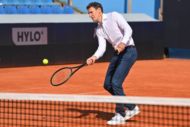 Patrik Kuehnen, Tournament Director BMW Open , plays tennis on the Center Court Action Tennis BMW Open 2024 from 13 04 21 04 2024