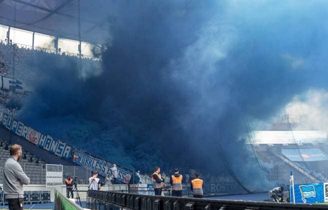 Soccer, Men, Season 2023 2024, 2 Bundesliga 29 Matchday , Hertha BSC F C Hansa Rostock, Fans of Hansa ignite pyrotechnics, 12 04 2024, Copyright: xSebastianxRäppold MatthiasxKochx