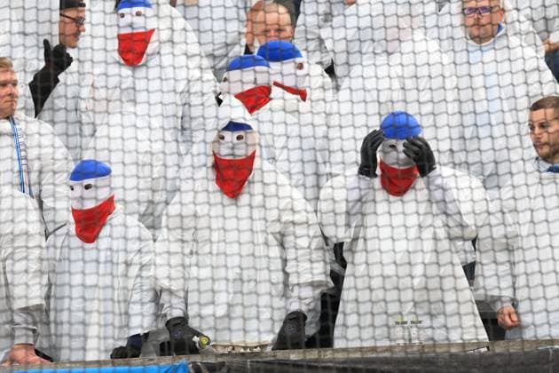 DEU, DFL, 2 FBL, Hertha BSC vs Hansa Rostock, 12 04 2024, Berliner Olympiastadion, Berlin, DEU, DFL, 2 FBL, Hertha BSC vs Hansa Rostock, in the picture Rostock fans, behind a net DFL regulations prohibit any use of Photographs as image sequences and or quasi video Foto Juergen Engler nordphoto GmbH nordphotoxGmbHx xEngler nph00076