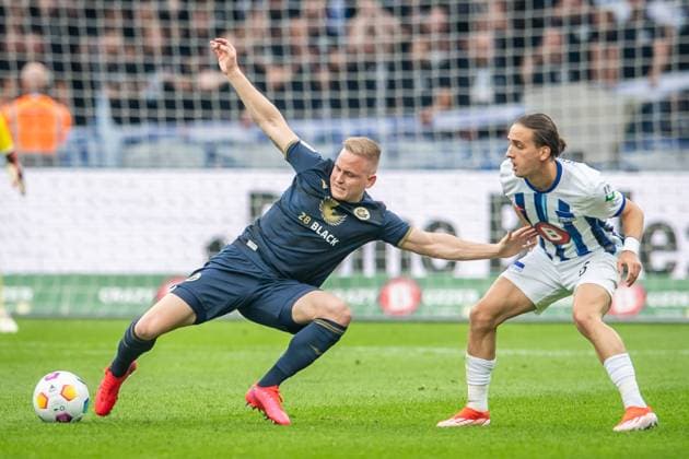 2 Soccer Bundesliga, Hertha BSC vs Hansa Rostock Berlin, 12 04 2024 Kai Pröger FC Hansa Rostock, 9 , Michal Karbownik Hertha BSC, 6 2 Soccer Bundesliga, Hertha BSC vs Hansa Rostock, Olympiastadion, Berlin, 12 04 2024 DFL REGULATIONS PROHIBIT ANY USE OF PHOTOGRAPHS AS IMAGE SEQUENCES AND OR QUASI VIDEO Copyright: xBEAUTIFULxSPORTS LucianoxLimax