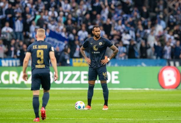 Football, Men, Season 2023 2024, 2 Bundesliga 29 Matchday , Hertha BSC F C Hansa Rostock, f l Kai Pröger Hansa Rostock , Junior Brumado Hansa Rostock , Disappointment after conceding 1 0, 12 04 2024, Copyright: xSebastianxRäppold MatthiasxKochx