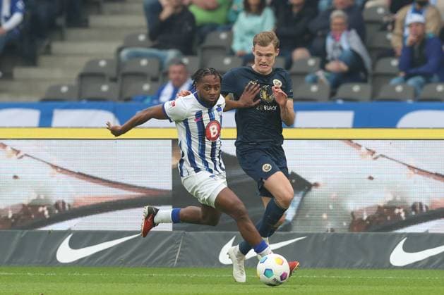 12 04 2024, xtgx, Football 2 Bundesliga, Hertha BSC Hansa Rostock emspor, v l Deyovaisio Zeefuik Hertha, 34 , Svante Ingelsson Rostock, 14 duel, duel, fight, tackle DFL DFB REGULATIONS PROHIBIT ANY USE OF PHOTOGRAPHS as IMAGE SEQUENCES and or QUASI VIDEO Berlin