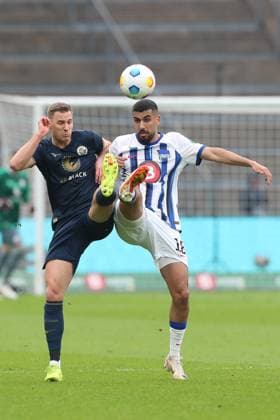 12 04 2024, xtgx, Soccer 2 Bundesliga, Hertha BSC Hansa Rostock emspor, v l Dennis Dressel Rostock, 6 , Aymen Barkok Hertha, 18 duel, fight, tackle DFL DFB REGULATIONS PROHIBIT ANY USE OF PHOTOGRAPHS as IMAGE SEQUENCES and or QUASI VIDEO Berlin