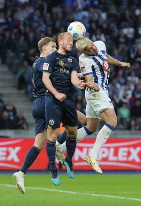 Svante Ingelsson, Sebastian Vasiliadis, Marc Oliver Kempf duel match scene Action Sport Football Soccer DFL 2 Bundesliga Men 29 Matchday Season 2023 2024 12 04 2024 Hertha BSC Berlin vs FC Hansa Rostock DFL regulations prohibit any use of photographs as image sequences and or quasi video