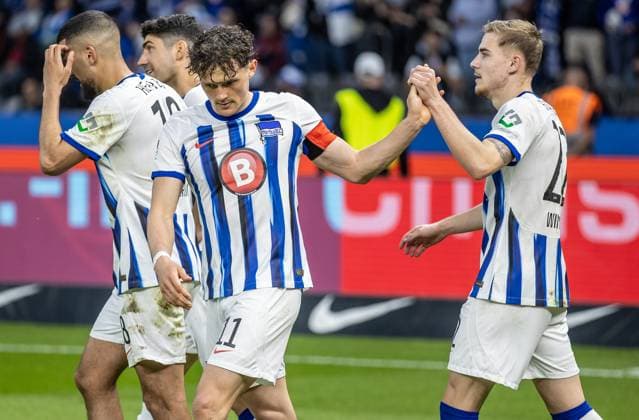 Berlin, 12 04 2024, Soccer, 2 Bundesliga, Matchday 29, Hertha BSC Hansa Rostock, Olympiastadion Berlins Fabian Reese and Marten Winkler clap each other after Dardais goal for 3 0 DFL regulations and DFB regulations prohibit any use of photographs as image sequences and or quasi video, Foto Andreas Gora Hertha BSC Hansa Rostock