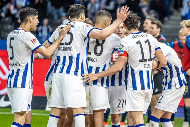 Berlin, 12 04 2024, Soccer, 2 Bundesliga, Matchday 29, Hertha BSC Hansa Rostock, Olympiastadion Berlins Palko Dardai M cheers with teammates after his goal for 3 0 DFL regulations and DFB regulations prohibit any use of photographs as image sequences and or quasi video, Foto Andreas Gora Hertha BSC Hansa Rostock