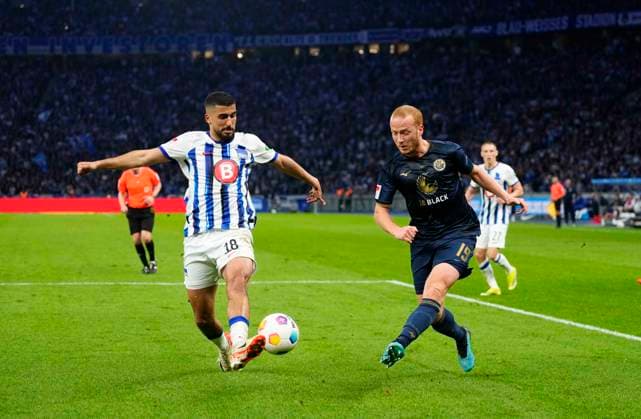 Germany, Berlin, 12 04 2024, Olympic Stadium, Hertha BSC vs FC Hansa Rostock 2 Bundesliga, Sebastian Vasiliadis FC Hansa Rostock controls the ball Berlin Olympic Stadium Berlin Germany eu-images-659