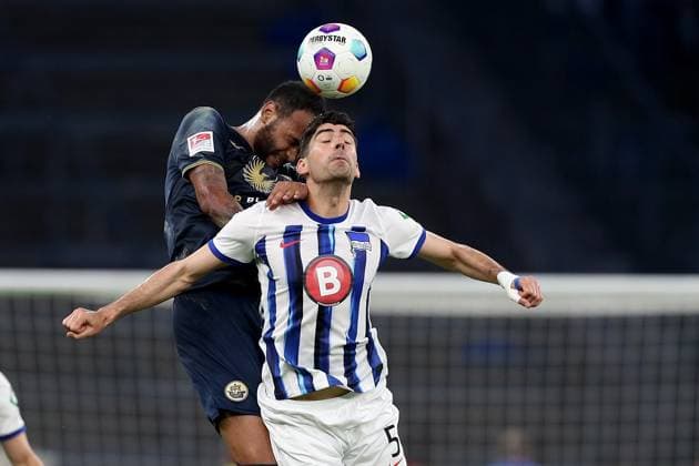 12 04 2024, xtgx, Fussball 2 Bundesliga, Hertha BSC FC Hansa Rostock emspor, v l Junior Brumado FC Hansa Rostock Andreas Bouchalakis Hertha BSC Berlin Zweikampf, Aktion, action, battle for the ball DFL DFB REGULATIONS PROHIBIT ANY USE OF PHOTOGRAPHS as IMAGE SEQUENCES and or QUASI VIDEO Berlin