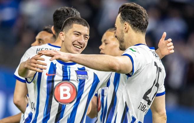 Berlin, 12 04 2024, Soccer, 2 Bundesliga, Matchday 29, Hertha BSC Hansa Rostock, Olympiastadion Berlins Haris Tabakovic r celebrates after his goal to 4 0 with Ibrahim Maza DFL regulations and DFB regulations prohibit any use of photographs as image sequences and or quasi video, Foto Andreas Gora Hertha BSC Hansa Rostock