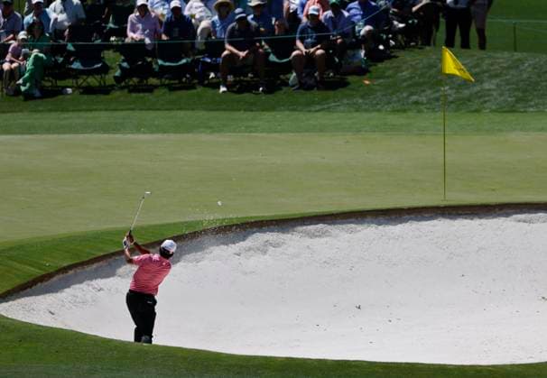 Japan s Hideki Matsuyama plays out of a bunker on the fourth hole in the second round of the Masters Tournament at Augusta National Golf Club in Augusta, Georgia on Friday, April 12, 2024.  AUG202404125674 TANNENxMAURY