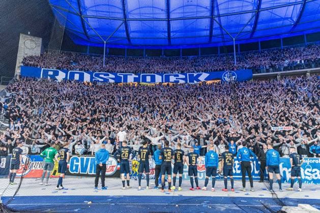 Berlin, Germany 12 April 2024 2 BL 2023 2024 Hertha BSC vs FC Hansa Rostock In the picture The fans of Hansa Rostock celebrate the defeat like a victory The team in front of the visitors curve DFL regulations prohibit any use of photographs as image sequences and or quasi video Copyright: xFotostandx xVoelkerx