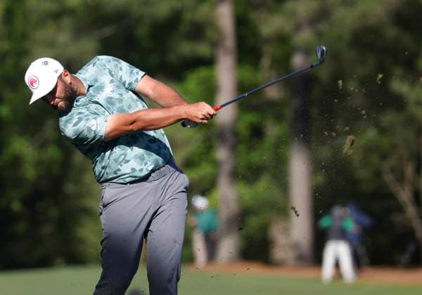 Spain s Jon Rahm tees off on the twelfth hole during the second round of the Masters Tournament at Augusta National Golf Club in Augusta, Georgia on Friday, April 12, 2024.  AUG20240412593 TANNENxMAURY