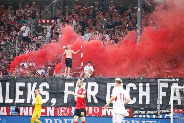 13 04 2024, xavx, Soccer 2 Bundesliga, SV Wehen Wiesbaden Fortuna Düsseldorf emspor, v l spectators, fans, flags, Ultras, scarves ignite smoke pots, pyrotechnics, pyro DFL DFB REGULATIONS PROHIBIT ANY USE OF PHOTOGRAPHS as IMAGE SEQUENCES and or QUASI VIDEO Wiesbaden