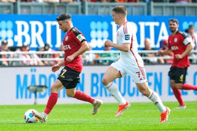 Robin Heußer SV Wehen Wiesbaden, 7 in duel with Cristos Tzolis Fortuna Duesseldorf, 07 , GER, SV Wehen Wiesbaden vs Fortuna Duesseldorf, Soccer, 2 Bundesliga, Matchday 29, Season 2023 2024, 13 04 2024 DFL REGULATES PROHIBIT ANY USE OF PHOTOGRAPHS AS IMAGE SEQUENCES AND OR QUASI VIDEO GER, SV Wehen Wiesbaden vs Fortuna Duesseldorf, Football, 2 Bundesliga, Matchday 29, Season 2023 2024, 13 04 2024 Wiesbaden Copyright: xEibner-Pressefoto FlorianxWieganx EP_FWD