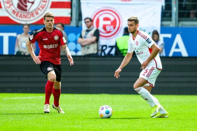 Joshua Quarshie Fortuna Duessledorf, 05 on the ball, Marcus Mathisen SV Wehen Wiesbaden, 24 , GER, SV Wehen Wiesbaden vs Fortuna Duesseldorf, Soccer, 2 Bundesliga, Matchday 29, Season 2023 2024, 13 04 2024 DFL REGULATES PROHIBIT ANY USE OF PHOTOGRAPHS AS IMAGE SEQUENCES AND OR QUASI VIDEO GER, SV Wehen Wiesbaden vs Fortuna Duesseldorf, Football, 2 Bundesliga, Matchday 29, Season 2023 2024, 13 04 2024 Wiesbaden Copyright: xEibner-Pressefoto FlorianxWieganx EP_FWD