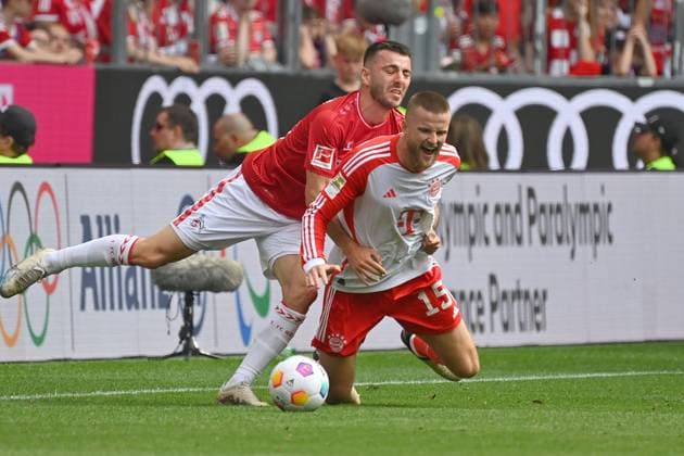 Sargis ADAMYAN 1 FC Koeln , Action,duel against Eric DIER Bayern Muenchen Football 1 Bundesliga Season 2023 2024, 29 Matchday, Matchday29, FC Bayern Muenchen 1 FC Koeln on 12 04 2024 , A L L I A N Z A R E N A