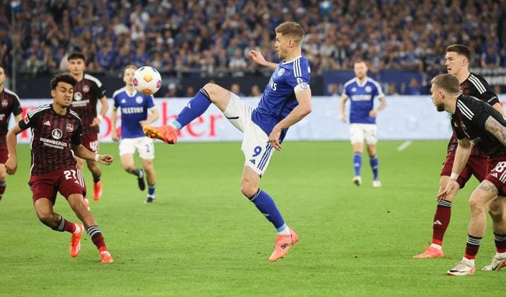 Simon Terodde FC Schalke 04, 9 and Nathaniel Brown 1 Nuernberg, 27 , FC Schalke 04 vs 1 FC Nuernberg, 2 Soccer Bundesliga, Soccer, Season 2023 24, 29 Matchday, 13 04 2024, DFL REGULATIONS PROHIBIT ANY USE OF PHOTOGRAPHS AS IMAGE SEQUENCES AND OR QUASI hVIDEO, FC Schalke 04 vs 1 FC Nuernberg, 2 Fussball Bundesliga, Football, Season 2023 24, 29 Matchday, 13 04 2024, Gelsenkirchen Copyright: xEibner-Pressefoto JoergxNiebergax EP_JNL