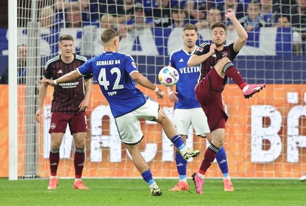 13 04 2024 Soccer Season 2023 2024 2 Soccer Bundesliga 29 Matchday FC Schalke 04 S04 Knappen 1 FC Nuremberg FCN Club Sportfoto Zink DaMa xdaxmax DFL regulations prohibit any use of photographs as image sequences and or quasi video only for editorial use Keke Topp 42, FC Schalke 04 S04 Lukas Schleimer 36, 1 FC Nuremberg FCN