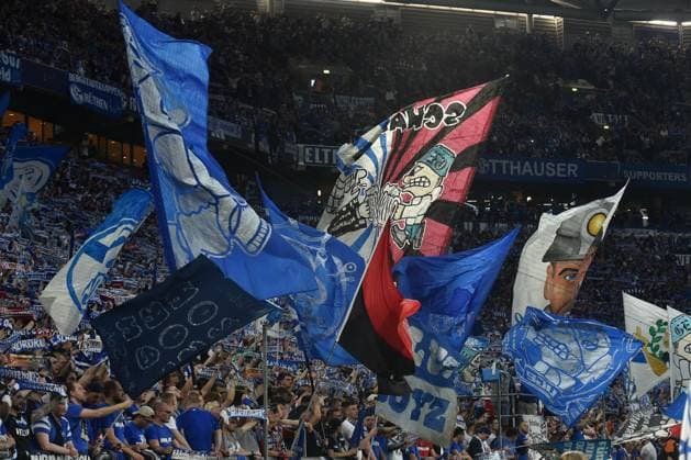 13 04 2024, Gelsenkirchen, Germany, VELTINS Arena, FC Schalke 04 vs 1 FC Nuernberg 2 Bundesliga, Fans Schalke 04 with flags banners Photo Ralf Treese DFB DFL REGULATIONS PROHIBIT ANY USE OF PHOTOGRAPHS AS IMAGE SEQUENCES AND OR QUASI VIDEO Gelsenkirchen VELTINS Arena North Rhine Westphalia Germany 521_S04FCN20240413_025 Treese-521