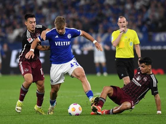 13 04 2024, Gelsenkirchen, Germany, VELTINS Arena, FC Schalke 04 vs 1 FC Nuernberg 2 Bundesliga, Jens Castrop 1 FC Nuernberg , Keke Topp FC Schalke 04 and Can Uzun 1 FC Nuernberg in duel Photo Ralf Treese DFB DFL REGULATIONS PROHIBIT ANY USE OF PHOTOGRAPHS AS IMAGE SEQUENCES AND OR QUASI VIDEO Gelsenkirchen VELTINS Arena North Rhine Westphalia Germany 521_S04FCN20240413_034 Treese-521