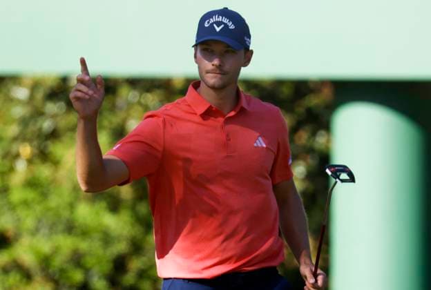 Denmark s Nicolai Hojgaard reacts after a birdie putt on the tenth green during the third round of the Masters Tournament at Augusta National Golf Club in Augusta, Georgia on Saturday, April 13, 2024.  AUG20240413545 TANNENxMAURY