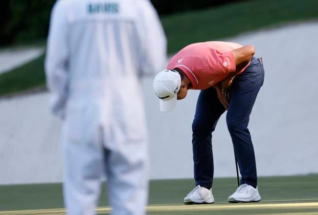 Collin Morikawa reacts after missing a birdie putt on the thirteenth hole during the third round of the Masters Tournament at Augusta National Golf Club in Augusta, Georgia on Saturday, April 13, 2024.  AUG20240413117 JOHNxANGELILLO