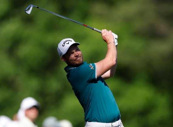England s Danny Willett hits his tee shot on the twelfth hole during the third round of the Masters Tournament at Augusta National Golf Club in Augusta, Georgia on Saturday, April 13, 2024.  AUG20240413140 JOHNxANGELILLO
