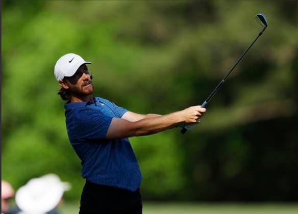 England s Tommy Fleetwood hits his tee shot on the twelfth hole during the third round of the Masters Tournament at Augusta National Golf Club in Augusta, Georgia on Saturday, April 13, 2024.  AUG20240413146 JOHNxANGELILLO