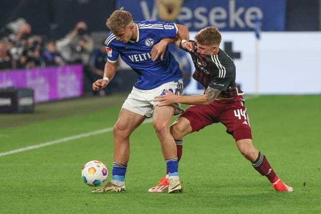 2 Bundesliga FC Schalke 04 1 FC Nürnberg on 13 04 2024 in the Veltins Arena at Schalke Keke Topp Schalke 42 vs Finn Jeltsch Nuernberg 44 MH