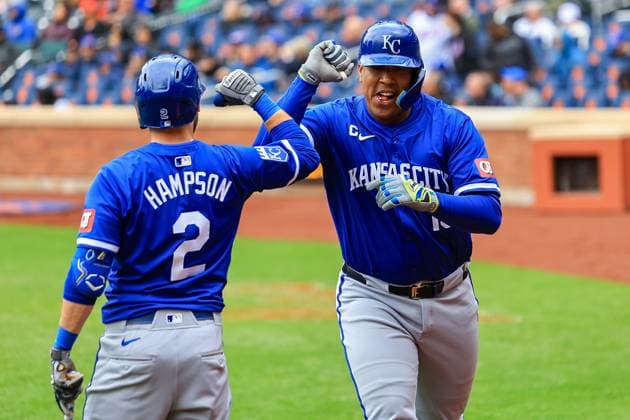 MLB, Baseball Herren, USA Kansas City Royals Vs New York Mets Salvador Perez 13 of the Kansas City Royals is being congratulated after hitting a home run during the fourth inning of a baseball game against the New York Mets at Citi Field in New York City, N.Y., on April 13, 2024. Perez is becoming the sixth Venezuela-born player to hit 250 homers and the 12th primary catcher in big league history to achieve this milestone. New York N.Y. United States  Copyright: xGordonxDonovanx originalFilename:donovan-kansasci240413_npyt2.jpg