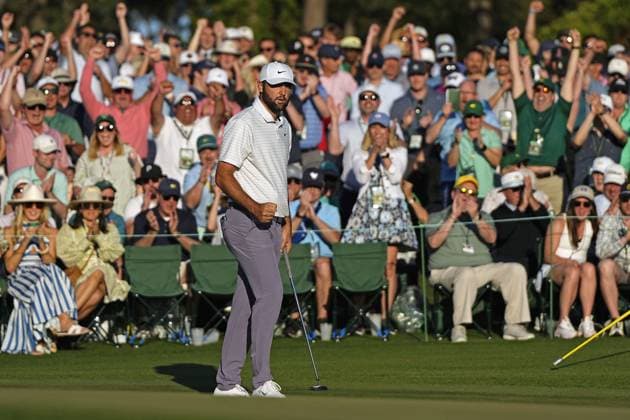 Golf: Masters Tournament Scottie Scheffler of the United States reacts after making a birdie on the 18th hole during the third round of the Masters Tournament at Augusta National Golf Club in Augusta, Georgia, on April 13, 2024.  A14AA0002706561P