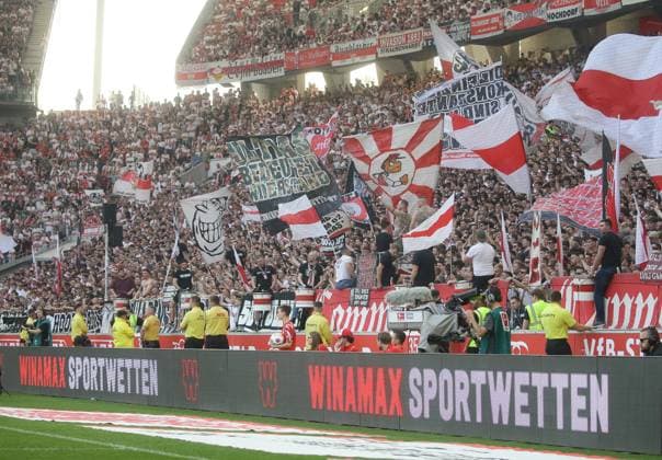 Stuttgart , Soccer Bundesliga VfB Stuttgart vs Eintracht Frankfurt , Stuttgart fans in the Cannstatter Kurve , in front of it the board Winamax Sportwetten According to the regulations of the DFL Deutsche Fußball Liga, it is prohibited to use or have used photographs taken in the stadium and or of the game in the form of sequential images and or video-like photo series