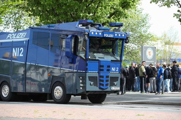 14 04 2024, xtgx, Soccer 2 Bundesliga, Soccer 2 Bundesliga, Eintracht Braunschweig Hannover 96 emspor, v l symbol photo, symbol picture police, policemen, derby, security, water cannon DFL DFB REGULATIONS PROHIBIT ANY USE OF PHOTOGRAPHS as IMAGE SEQUENCES and or QUASI VIDEO Braunschweig