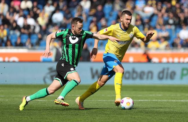 Braunschweig vs Hannover, 2 BL Braunschweig, 14 04 2024, FOOTBALL Eintracht Braunschweig vs Hannover 96, 2 BL, Season 2023 24 Cedric Teuchert Hannover 96 , Hasan Kurucay Eintracht Braunschweig Braunschweig