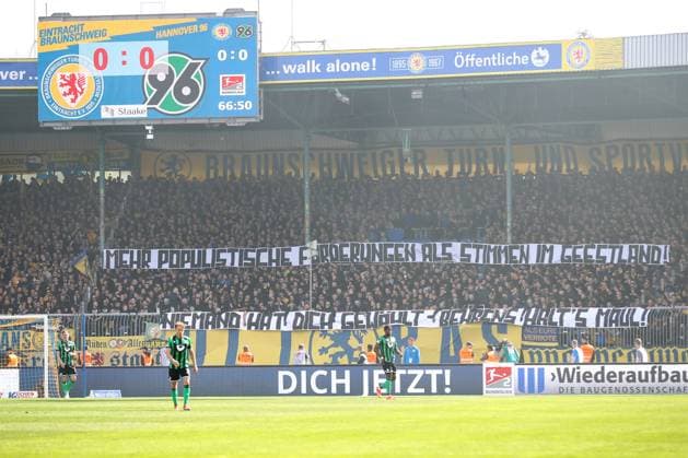 14 04 2024, xtgx, Soccer 2 Bundesliga, Soccer 2 Bundesliga, Eintracht Braunschweig Hannover 96 emspor, v l banner banner against Interior Minister Daniela Behrens Niemand hat dich gewaehlt, Behrens halts Maul DFL DFB REGULATIONS PROHIBIT ANY USE OF PHOTOGRAPHS as IMAGE SEQUENCES and or QUASI VIDEO Braunschweig